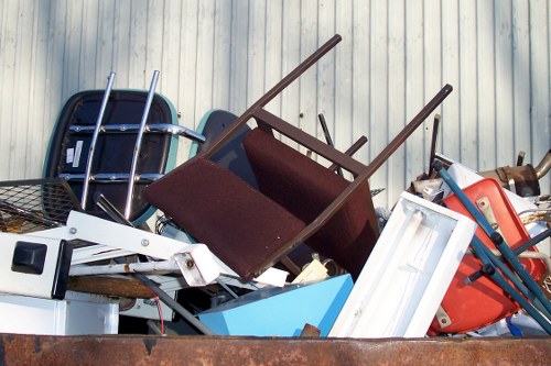 Workers managing building debris during a Shoreditch project